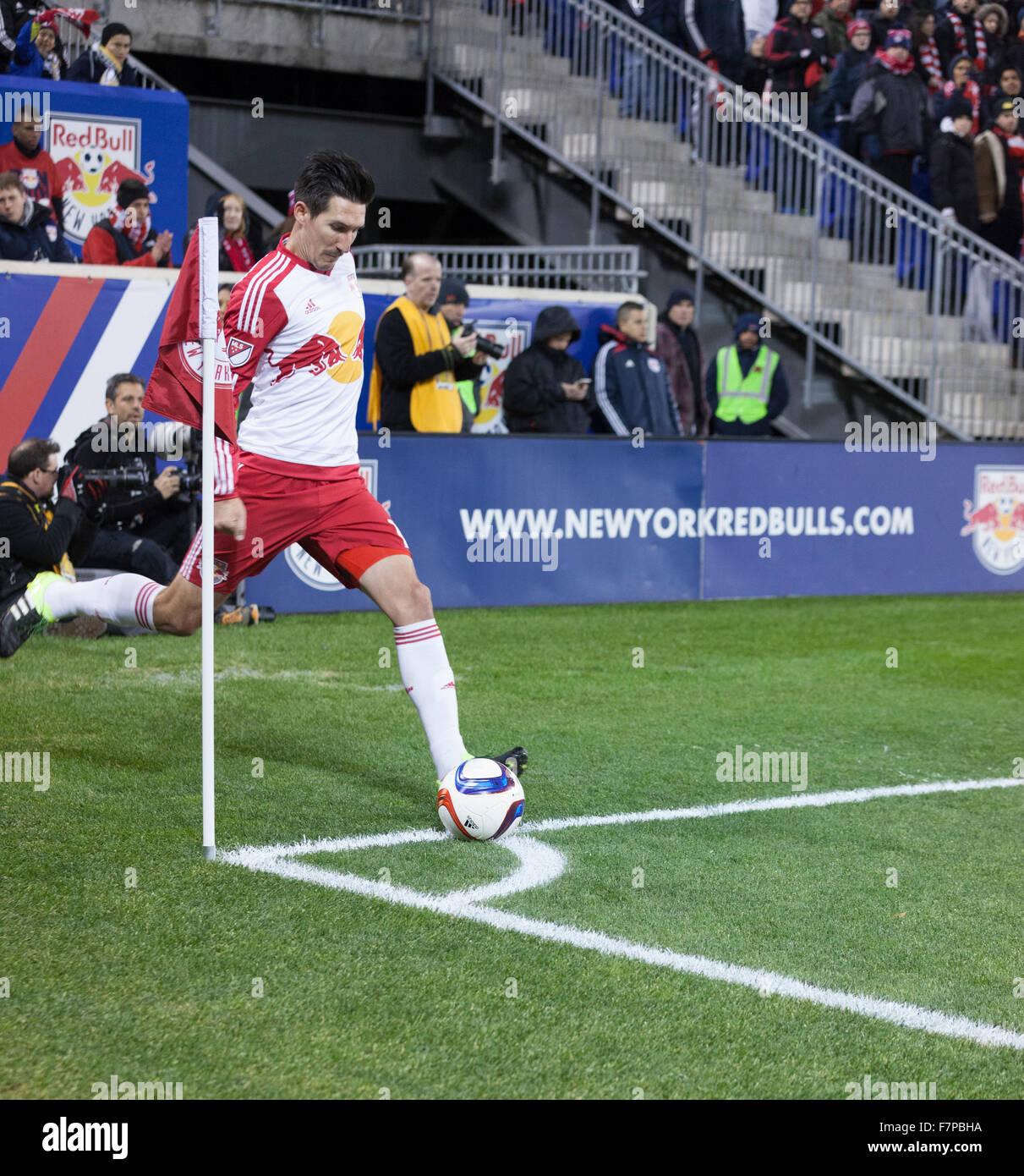 Harrison, NJ USA - November 29, 2015: Sacha Kljestan of New Red Bulls performs corner during MLS Eastern Conference Final against Columbus Crew SC Stock Photo