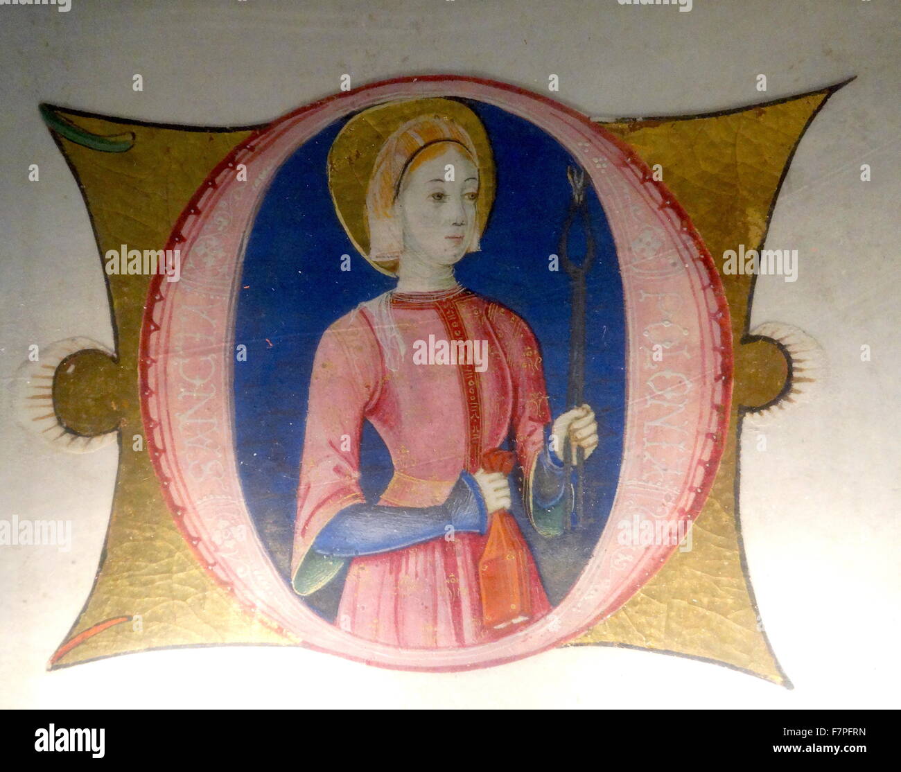 Initial O with St Apollonia. Dated 15th Century Stock Photo