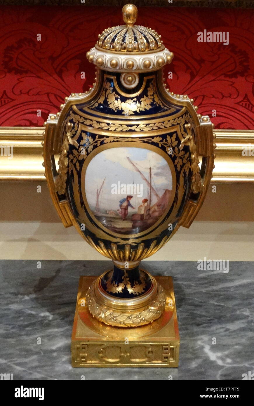 Soft-paste porcelain vase with gilt bronze stand. France. Dated 18th Century Stock Photo