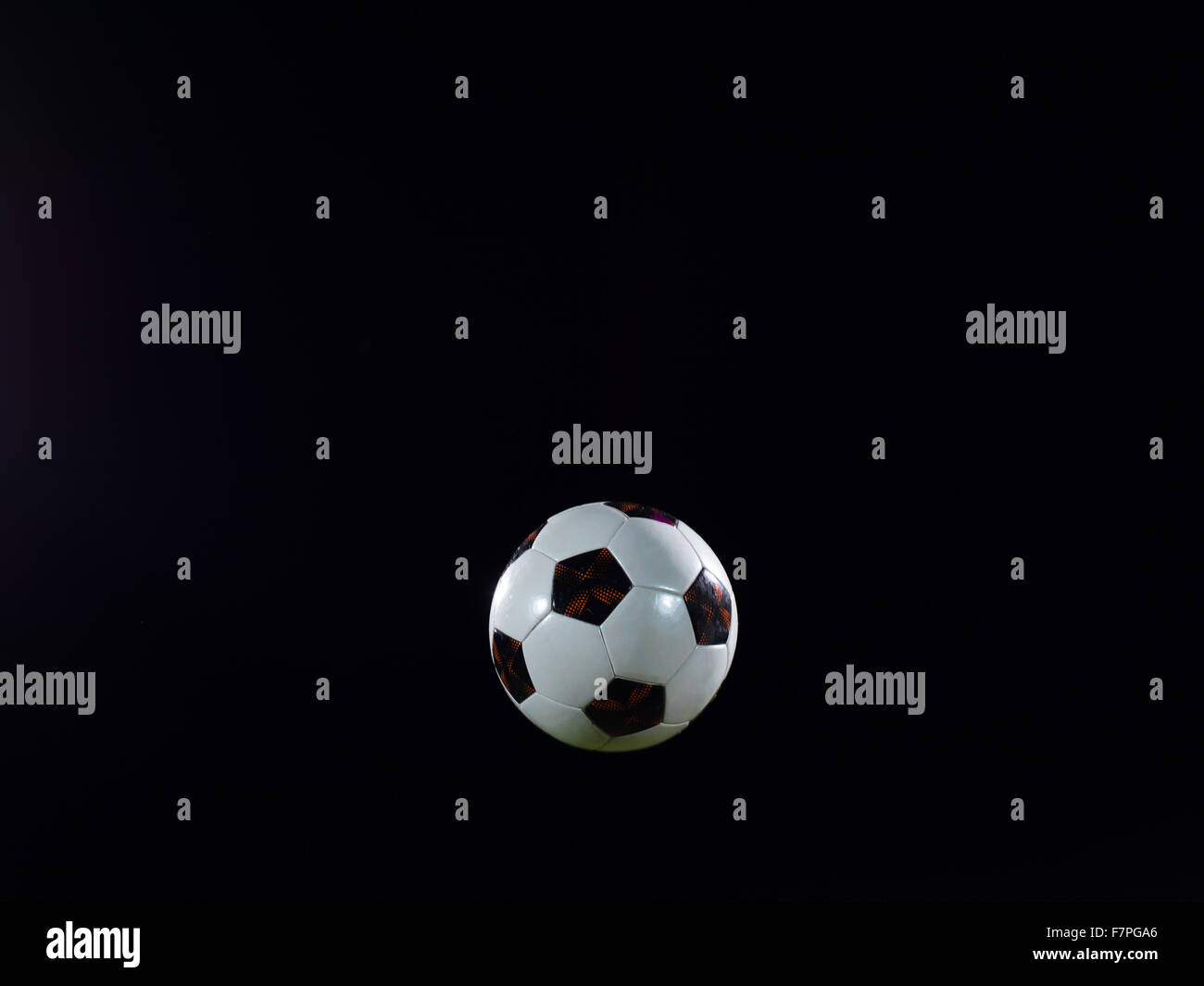 classic soccer football ball isolated on black background Stock Photo