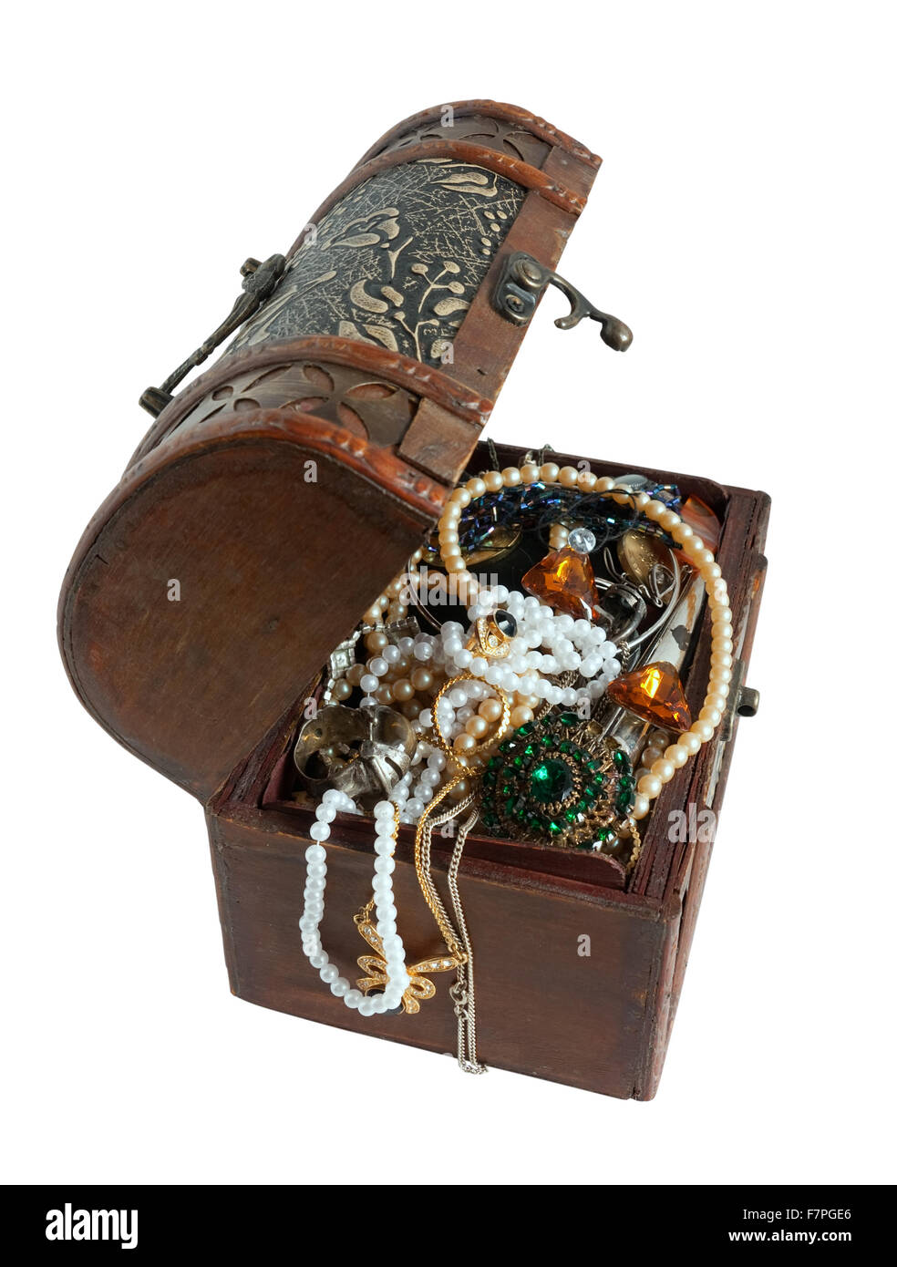 Wooden treasure chest with valuables, isolated with clipping path Stock