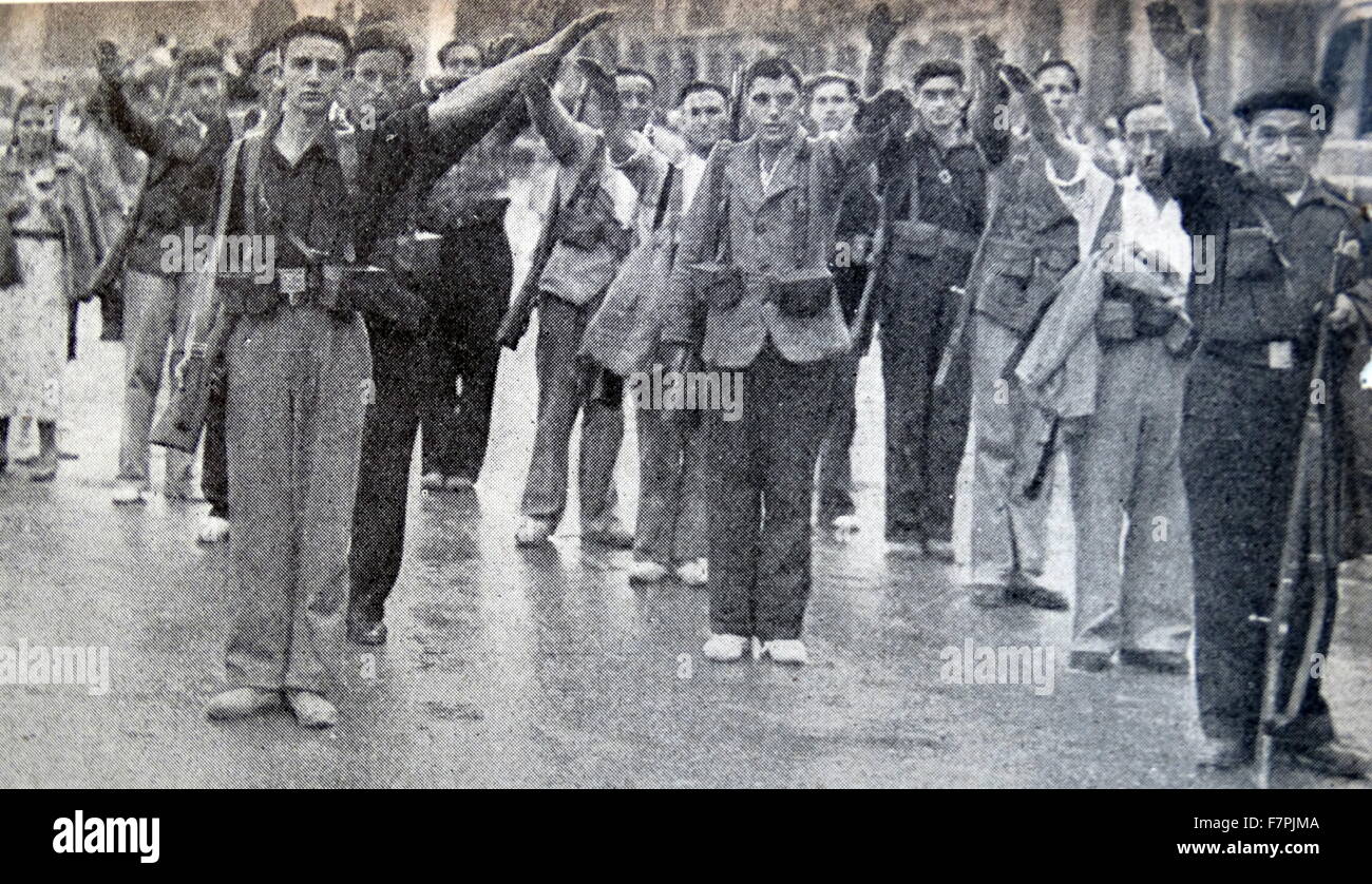 Falangist soldiers salute in a gathering in Pamplona during the Spanish Civil War. Dated 1936 Stock Photo