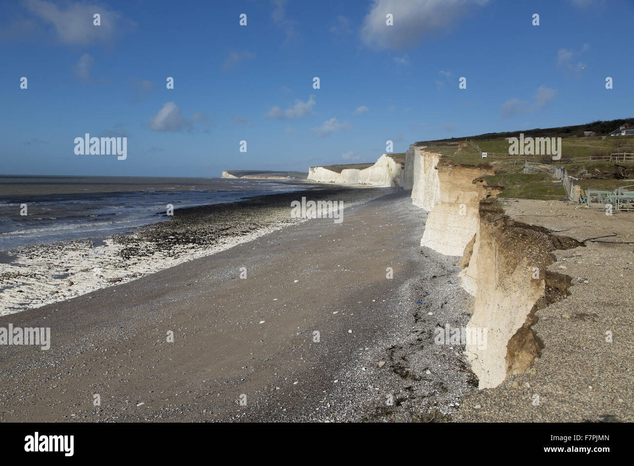 View of the storm-damaged cliffs and beach at Birling Gap, East Sussex, pictured here in February 2014. Extreme weather in January and February of that year resulted in seven years' worth of erosion at Birling Gap in just a few weeks. Stock Photo
