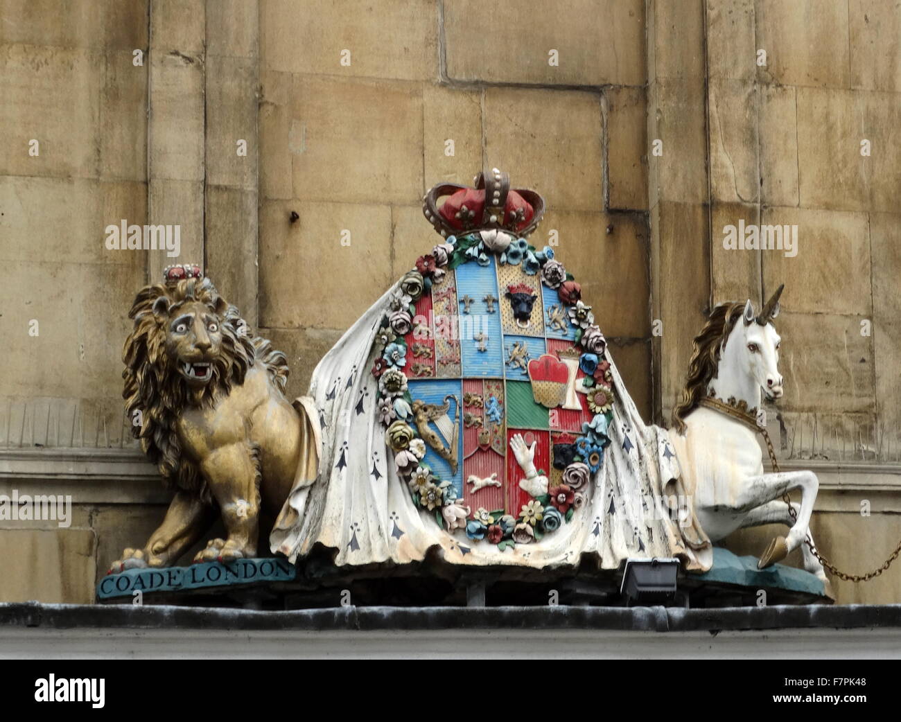 Royal Crest from the entrance to A H Hale Pharmacy ,established in 1826 and located in Argyle Street, Bath, England, may date from the 18th century Stock Photo