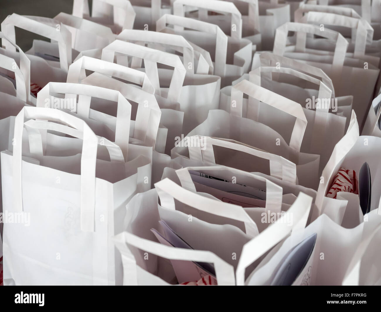 White paper bags in straight rows Stock Photo