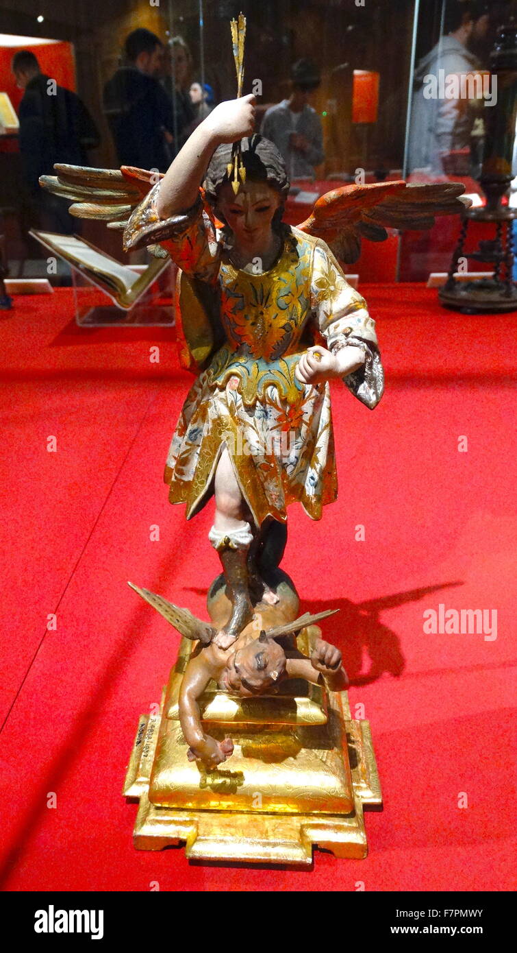 Statue of St. Michael the Archangel. St. Michael is seen as the advocate of the Jews and also as a protector and the leader of God's armies against evil. Made from gilded wood, from Spain, 1700-1850. Stock Photo