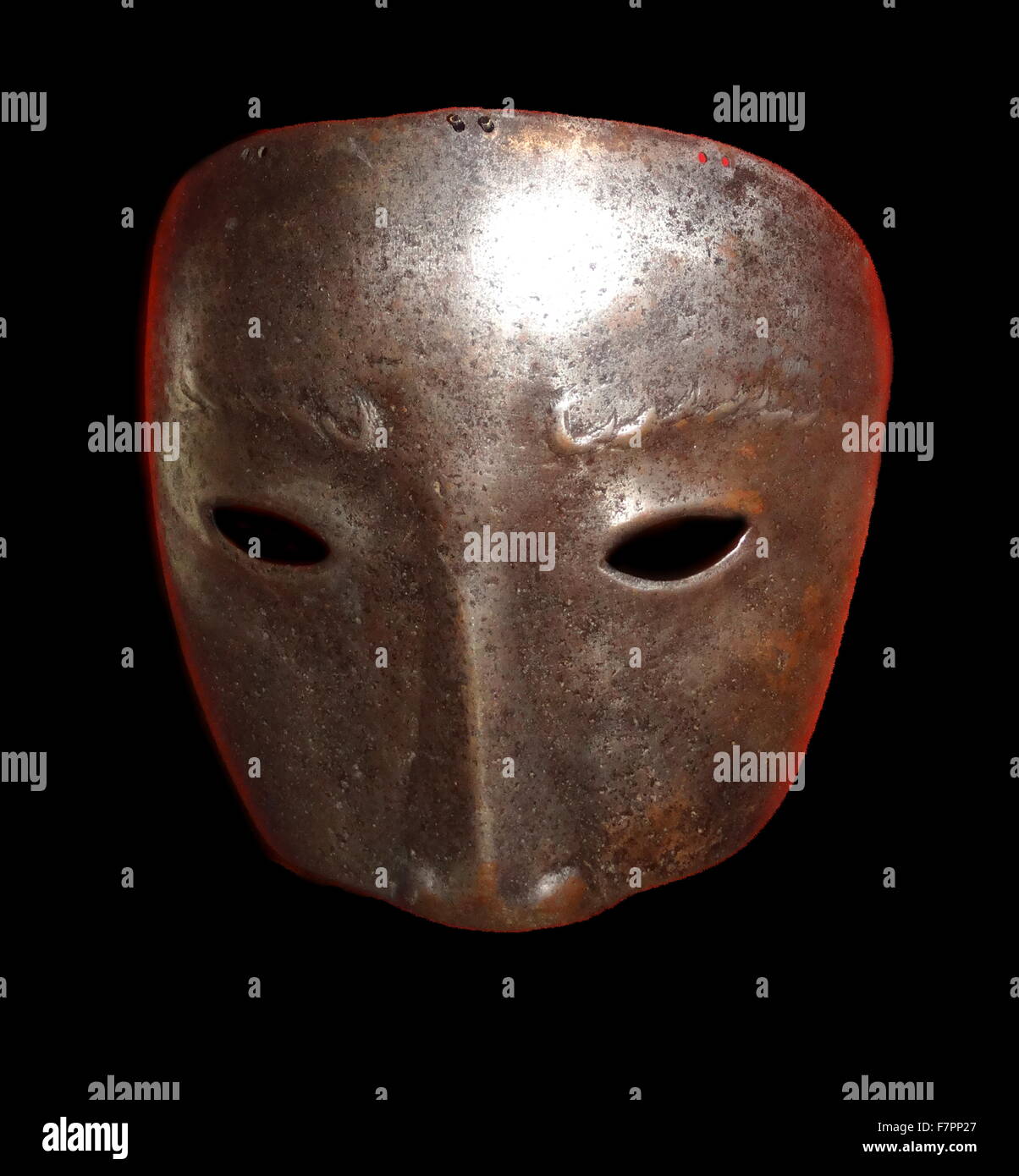 Executioner's mask. From a time of particular unrest in Portuguese history which culminated in the public execution of relatives of the king. Steel, Portuguese, 1501-1800. Stock Photo