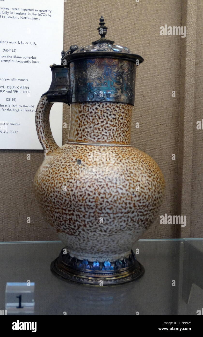 Salt-glazed stoneware jug, with painted enamels and pewter mounts. The inscription reads 'Saturnus, Jupiter, Mars, Venus, SOL'. Dated 17th Century Stock Photo