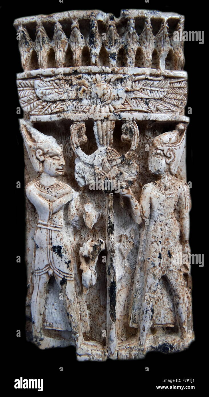 Ivory depicting figures wearing the crown of Egypt Stock Photo