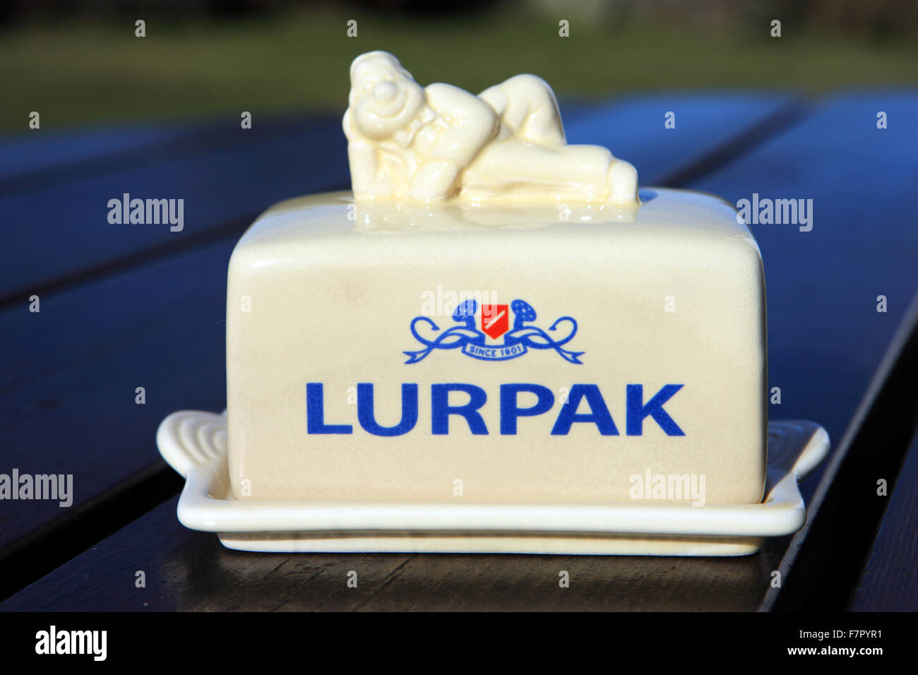 Lurpak butter dish with the Lurpark animated character, Douglas, on top. Stock Photo
