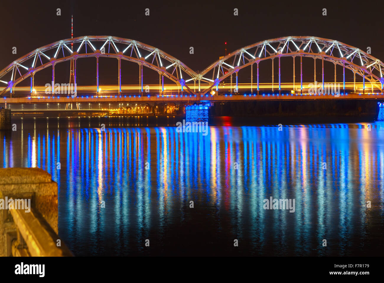Railway Bridge at night, Riga, Latvia Stock Photo