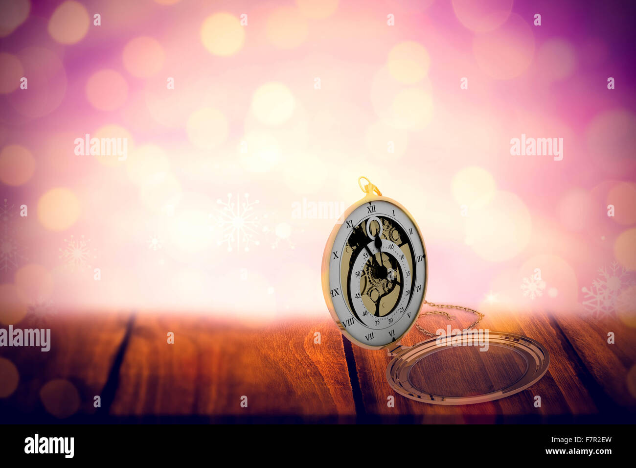 Composite image of antique pocket clock with chain Stock Photo