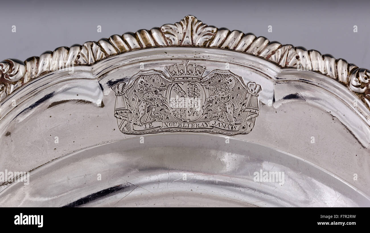Circular second course dish, 1754, Frederick Kandler, silver at Ickworth, Suffolk. National Trust Inventory number 852121.2. Detail of engraved arms of the 2nd Earl of Bristol. Stock Photo