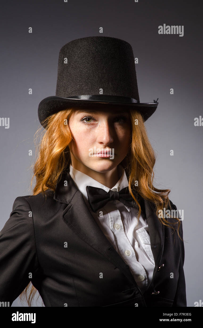 Pretty girl wearing retro hat isolated on gray Stock Photo - Alamy