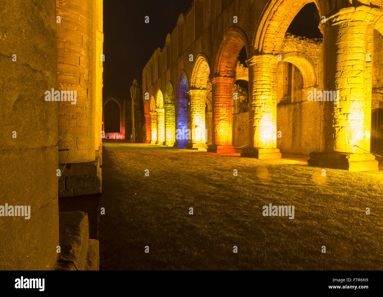 View inside Fountains Abbey, lit up at Christmas time, North Yorkshire