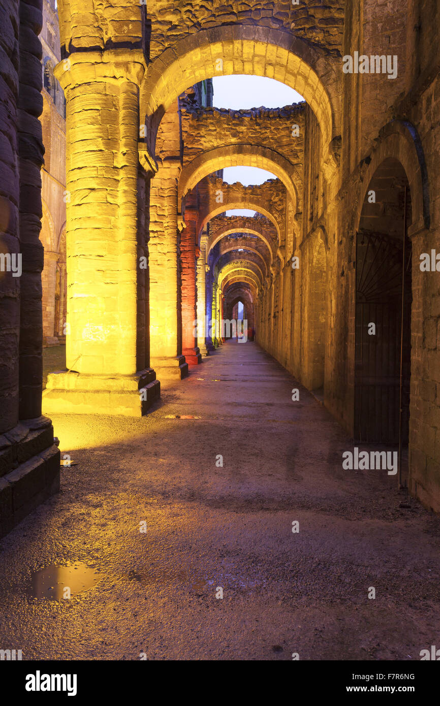 Fountains Abbey lit up with coloured lights at Christmas time, North