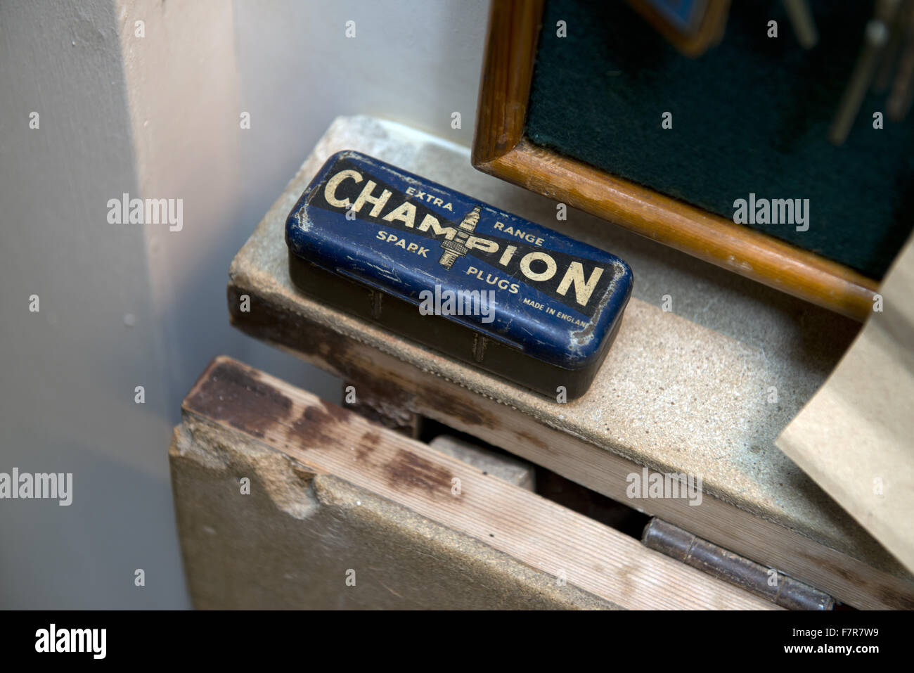 Box of Champion spark plugs at Anglesey Abbey, Gardens and Lode Mill, Cambridgeshire. Stock Photo