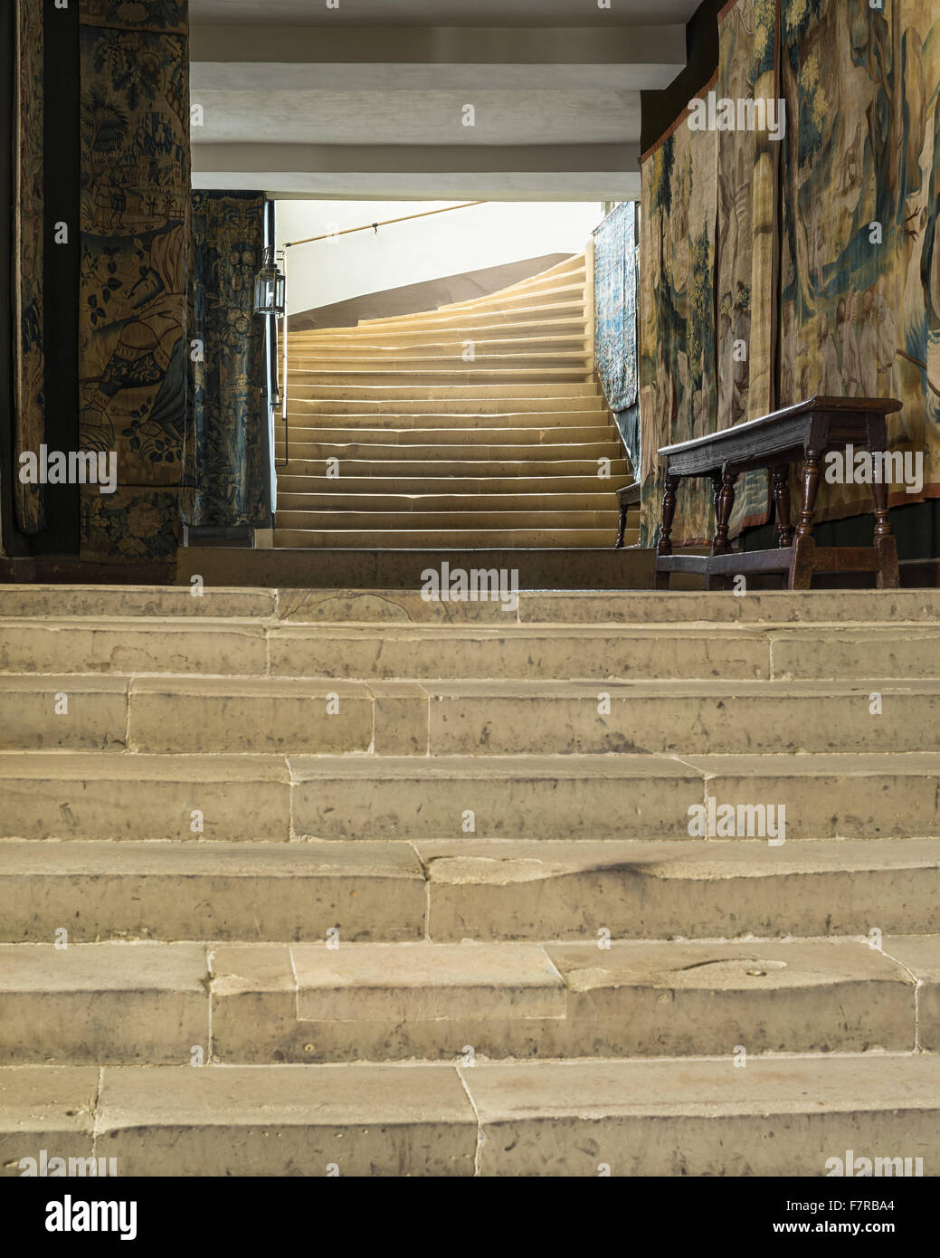 Looking up towards the Processional Staircase from the Half Landing at Hardwick Hall, Derbyshire. Hardwick Hall was built in the late 16th century for Bess of Hardwick. Stock Photo