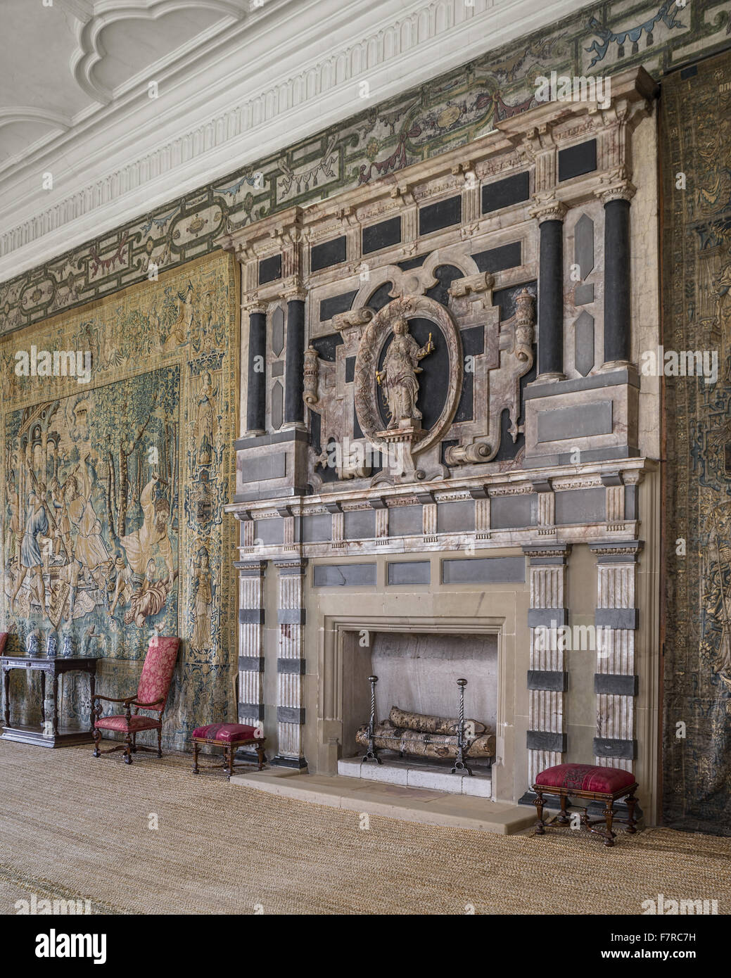 Fireplace with Justice as overmantle in the Long Gallery at Hardwick Hall, Derbyshire. Hardwick Hall was built in the late 16th century for Bess of Hardwick. Stock Photo