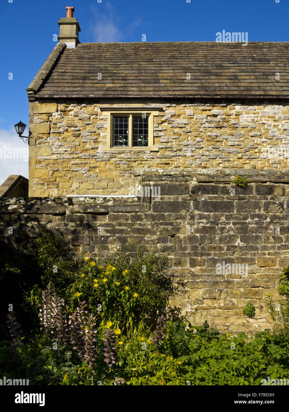 A corner of the walled garden at Eyam Hall and Craft Centre, Derbyshire. Stock Photo