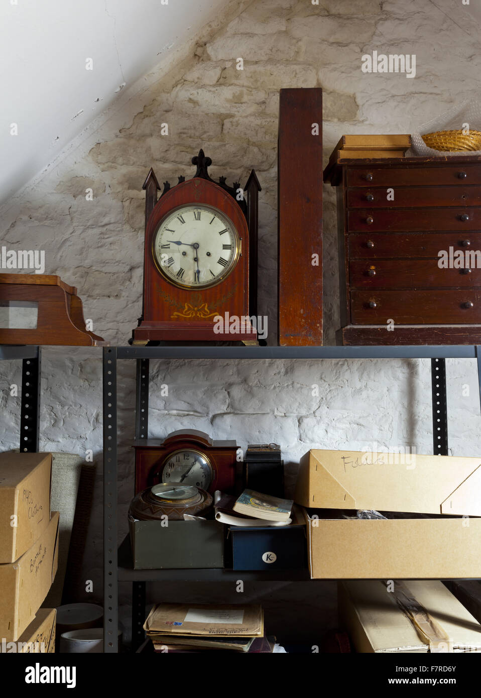 Objects stored in the attic at Eyam Hall and Craft Centre, Derbyshire. Eyam Hall is an unspoilt example of a gritstone Jacobean manor house, set within a walled garden. Stock Photo