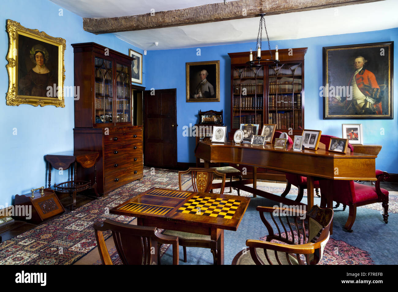 The Library at Eyam Hall and Craft Centre, Derbyshire. Eyam Hall is an unspoilt example of a gritstone Jacobean manor house, set within a walled garden. Stock Photo