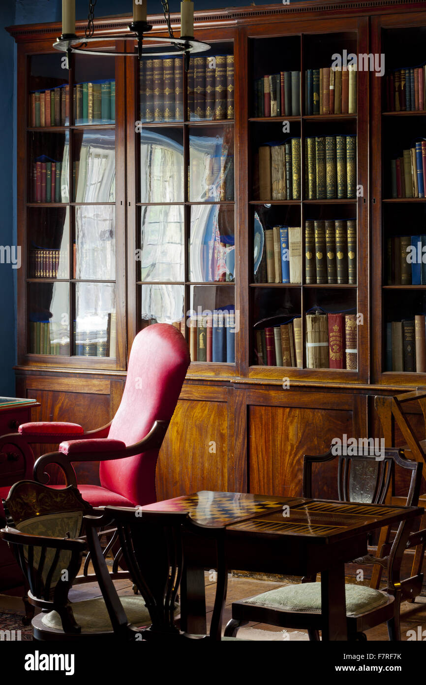 The Library at Eyam Hall and Craft Centre, Derbyshire. Eyam Hall is an unspoilt example of a gritstone Jacobean manor house, set within a walled garden. Stock Photo