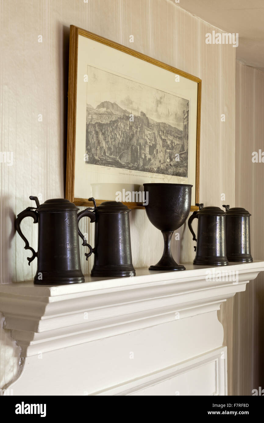 Pewter tankards and trophy in the Main Bedroom at Eyam Hall and Craft Centre, Derbyshire. Eyam Hall is an unspoilt example of a gritstone Jacobean manor house, set within a walled garden. Stock Photo