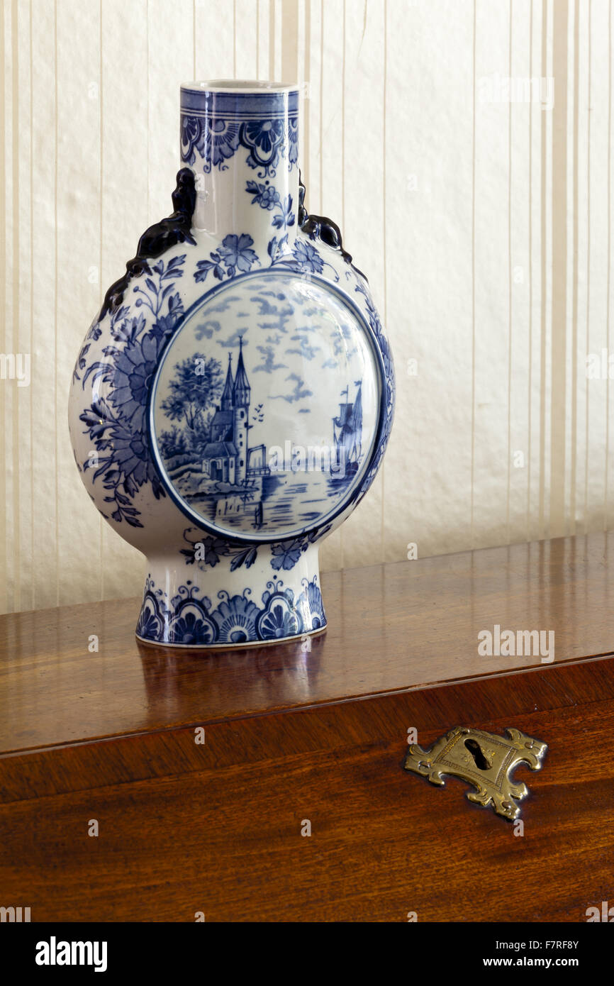A vase on the bureau in the Main Bedroom at Eyam Hall and Craft Centre, Derbyshire. Eyam Hall is an unspoilt example of a gritstone Jacobean manor house, set within a walled garden. Stock Photo