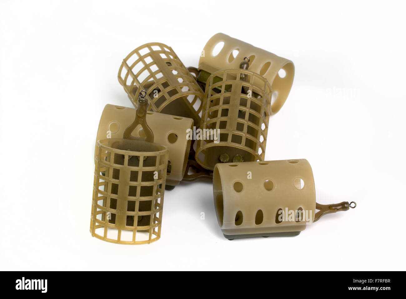 Six Feeders For Fishing On A White Background Stock Photo