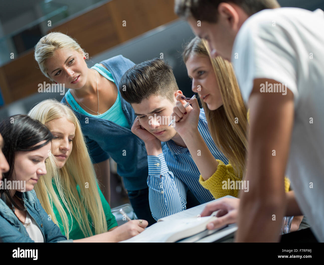 happy students group study in classroom Stock Photo - Alamy