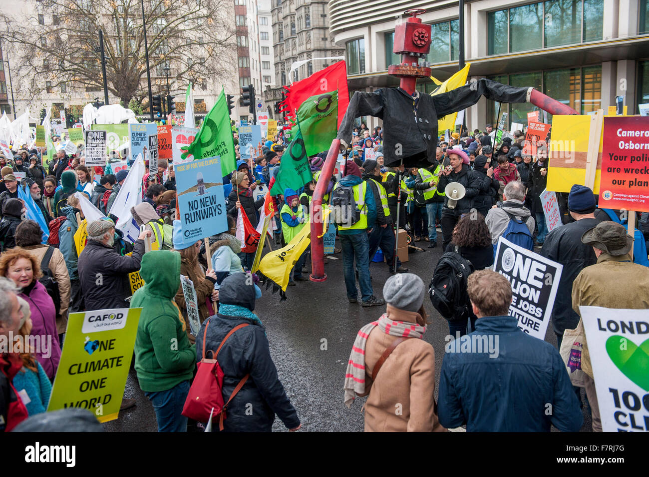 People taking part in the Climate March to Westminster, Millbank. This is a joint event with all the partners of The Climate Coa Stock Photo