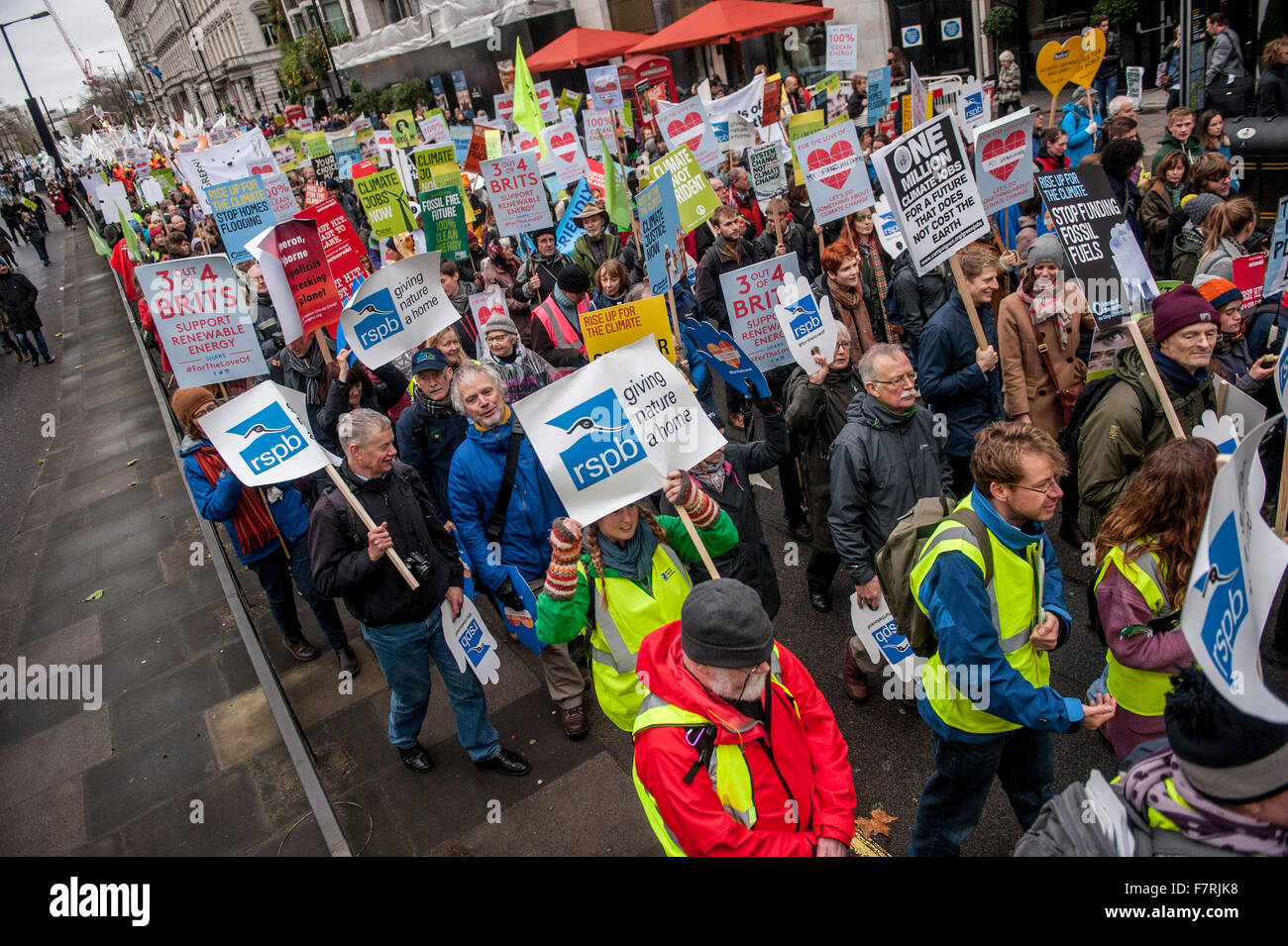 People taking part in the Climate March to Westminster, Millbank. This is a joint event with all the partners of The Climate Coa Stock Photo