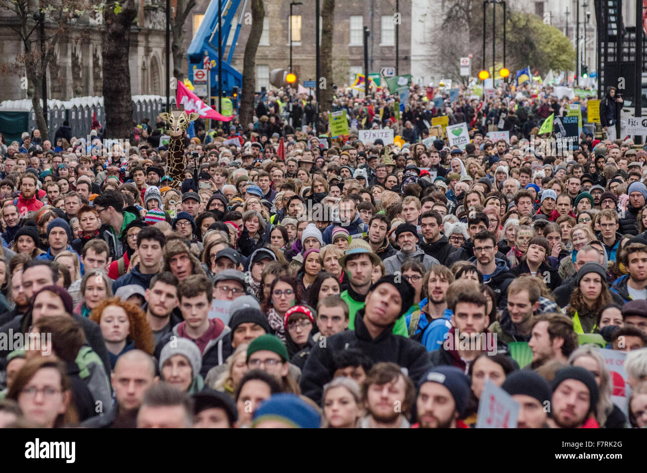 People taking part in the Climate March to Westminster, Millbank. This is a joint event with all the partners of The Climate Coa Stock Photo