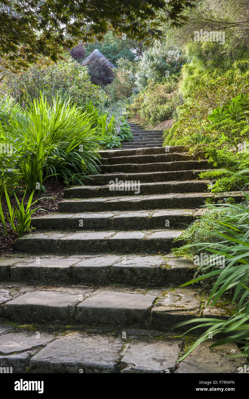 The steps to Tir na og at Mount Stewart, County Down. Mount Stewart has been voted one of the world's top ten gardens, and reflects the design and artistry of its creator, Edith, Lady Londonderry. Stock Photo