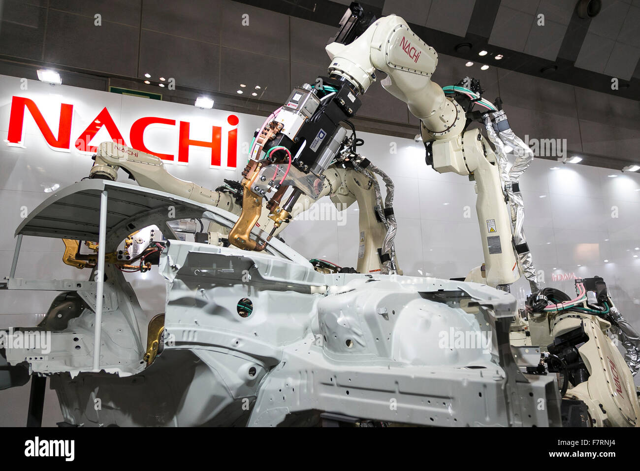 NACHI's industrial robots perform at the International Robot Exhibition 2015 on 2, 2015, Tokyo, 446 companies and organisations (from Japan and overseas) showed off new robots equipment Service