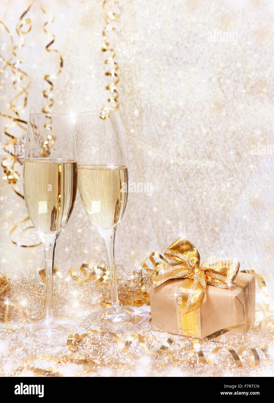 Champagne glasses golden ribbon hi-res stock photography and images - Alamy