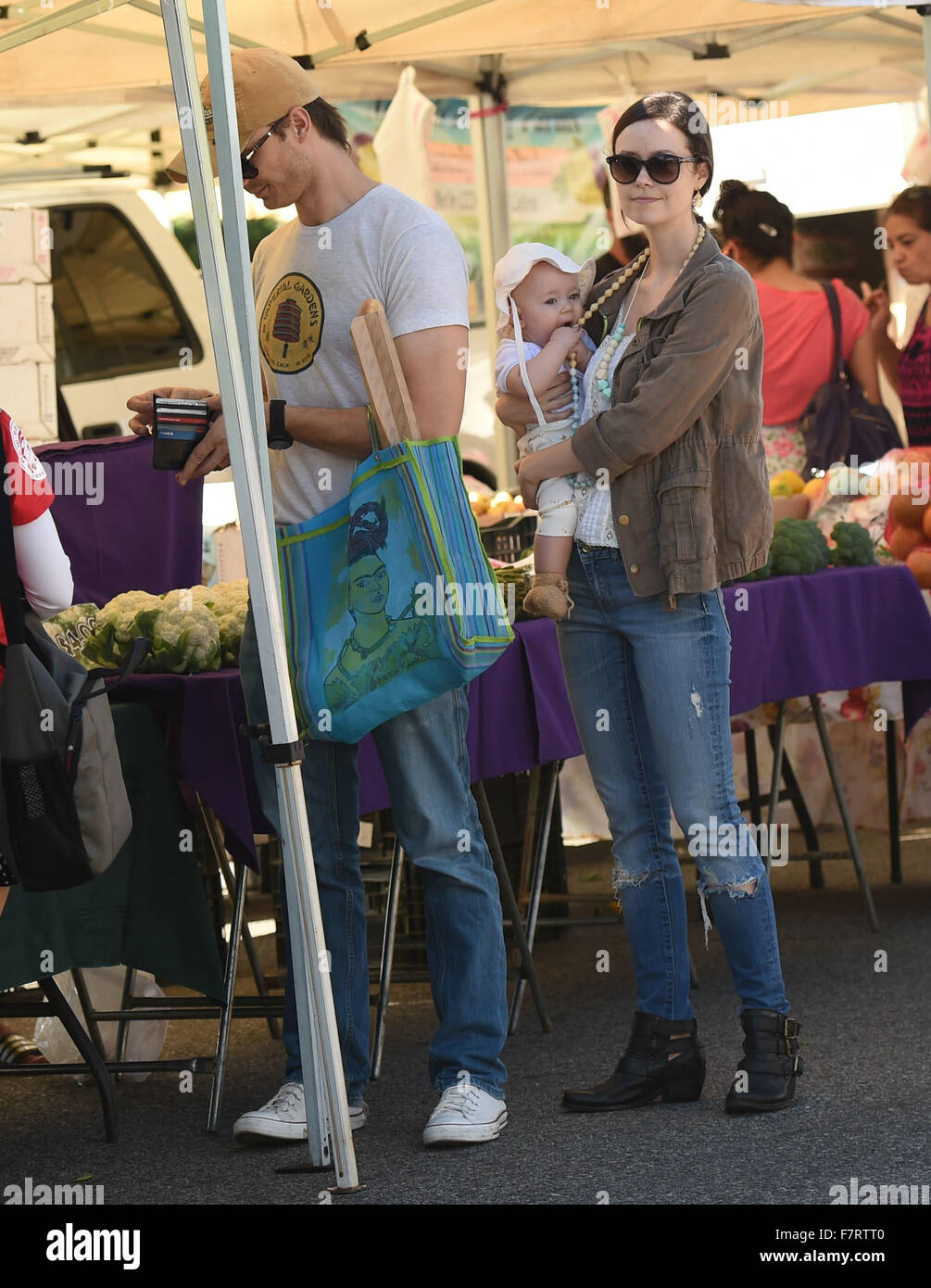 Summer Glau her husband, Val, and their baby girl, Milena, go to the Farmers Market  Featuring: Summer Glau, Val Morrison, Milena Where: Los Angeles, California, United States When: 01 Nov 2015 Stock Photo
