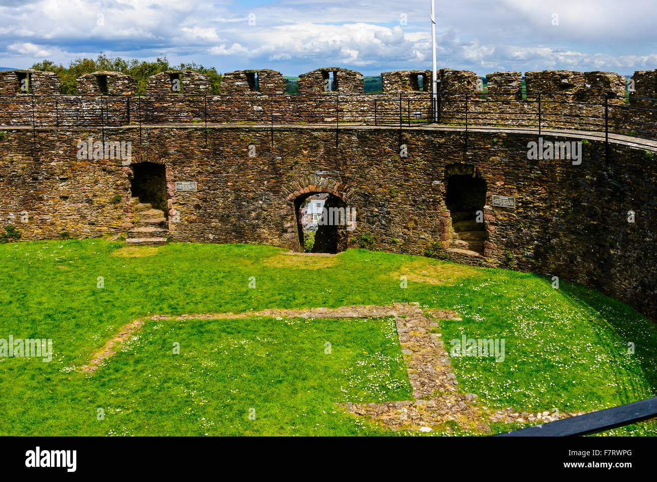 Stairwells leading up to the ramparts on either side of the arched ...