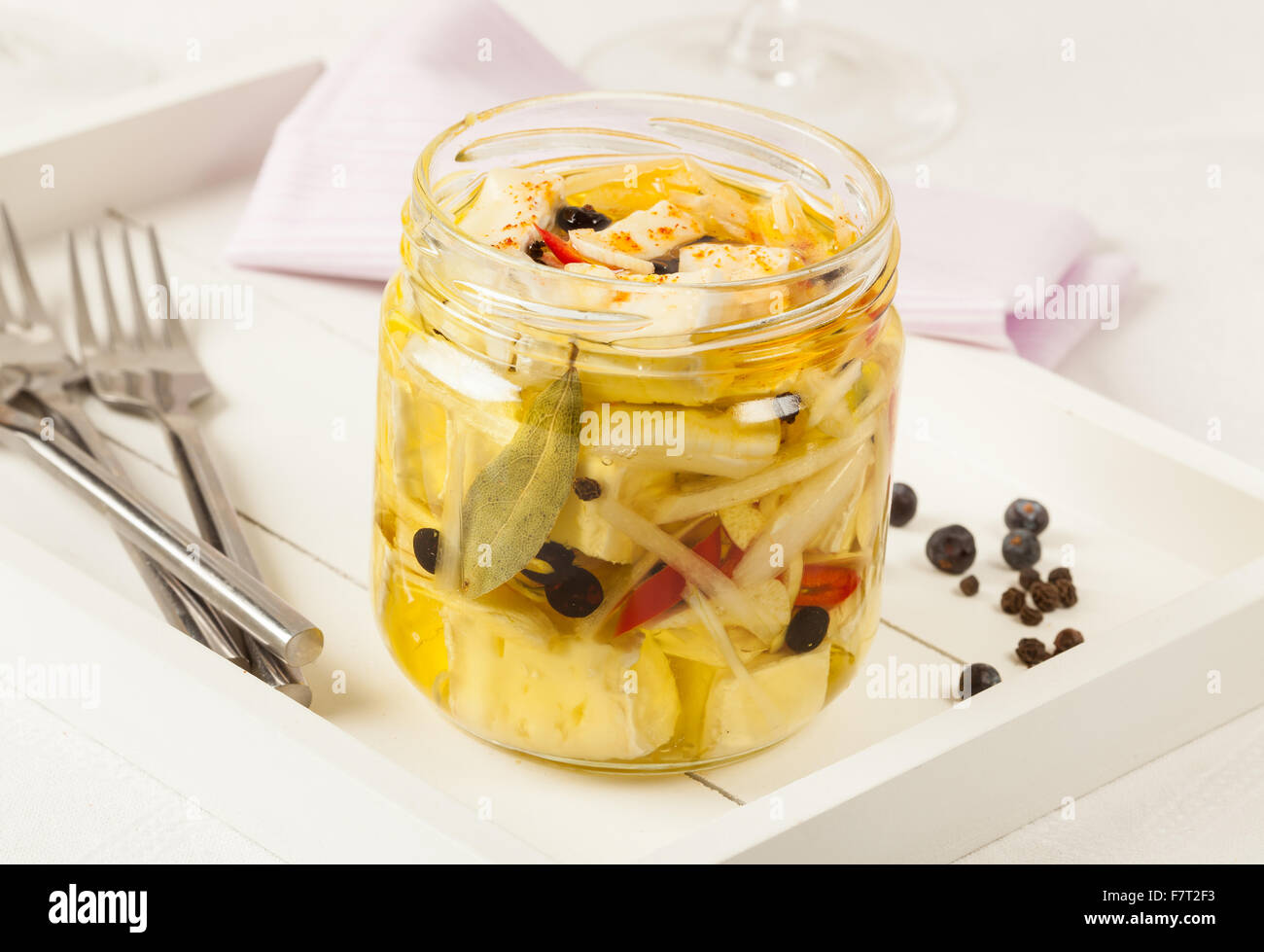 Marinated cheese in a jar Stock Photo Alamy