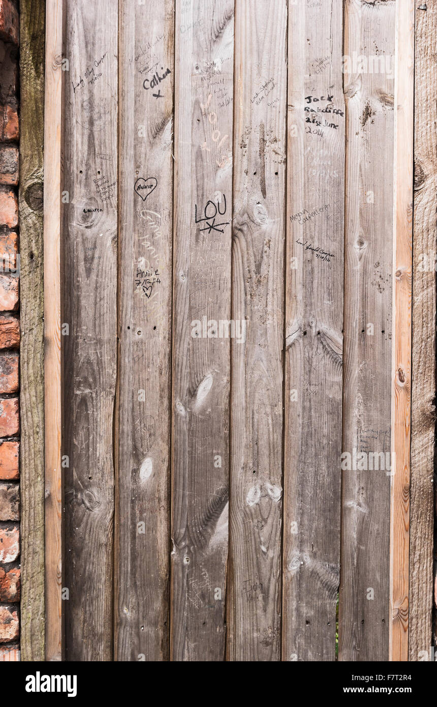 Door in back street with graffiti Stock Photo