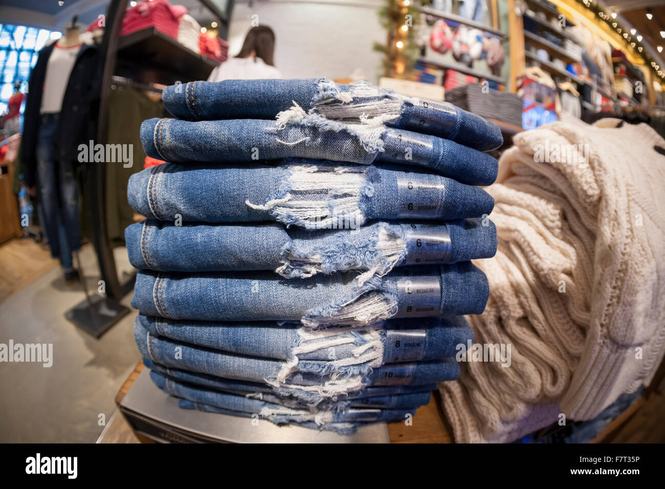 Distressed denim jeans at American Eagle Outfitters in the Herald Square  shopping district in New York on Thanksgiving Day, Thursday, November 26,  2015. Many retailers opened their doors on Thanksgiving day including