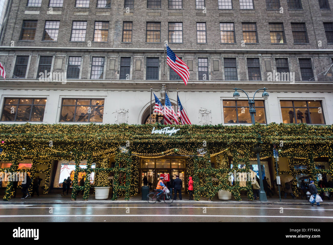 Lord & Taylor in New York, currently suffering the indignity of scaffolding in front of their main entrance, turns lemons into lemonade by turning the construction shed into an illuminated arcade, seen on Tuesday, December 1, 2015.  (© Richard B. Levine) Stock Photo