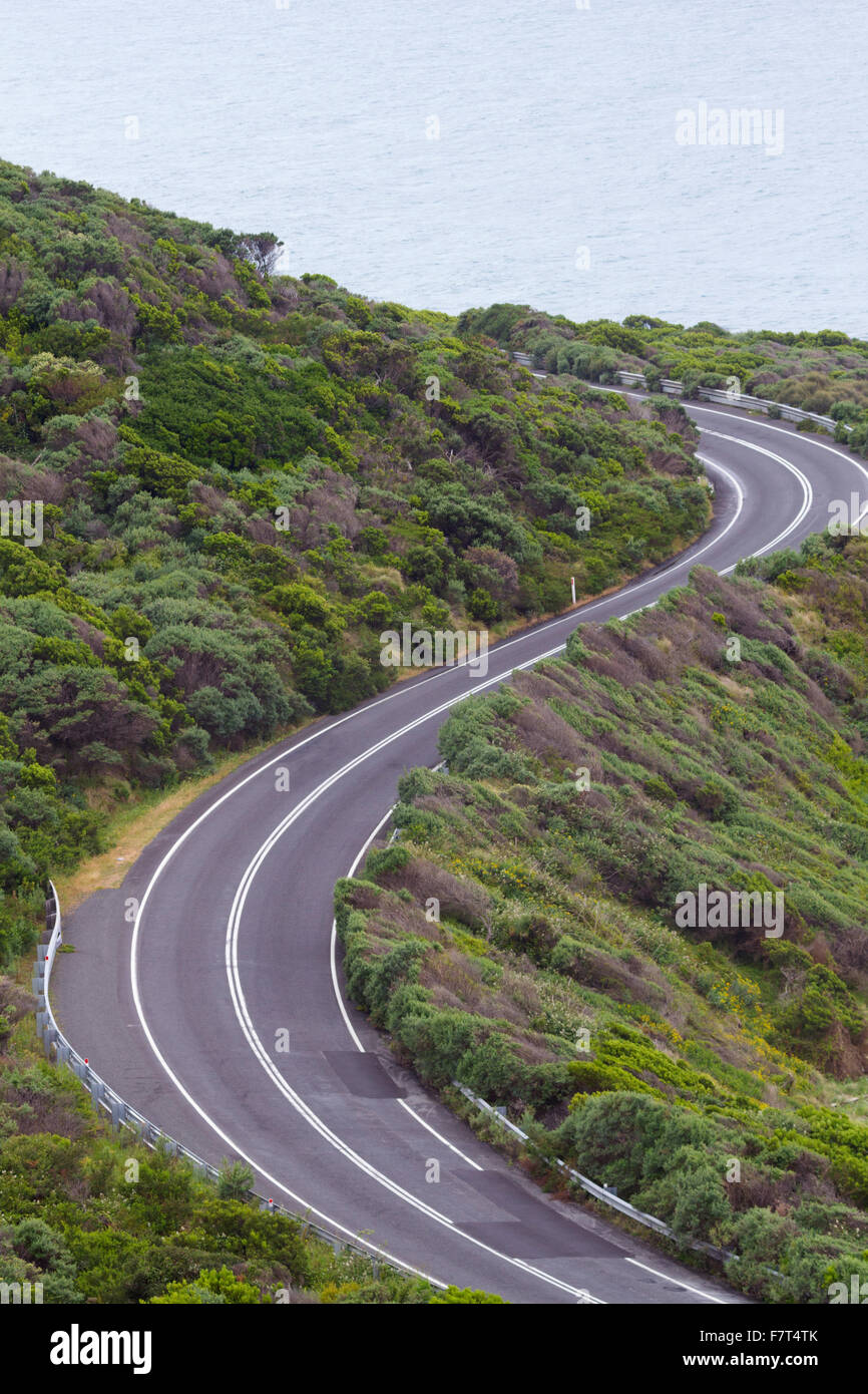 Enjoyable curves of Great Ocean Road in Victoria province of Australia.  Scenic drive along the Surf Coast. Stock Photo