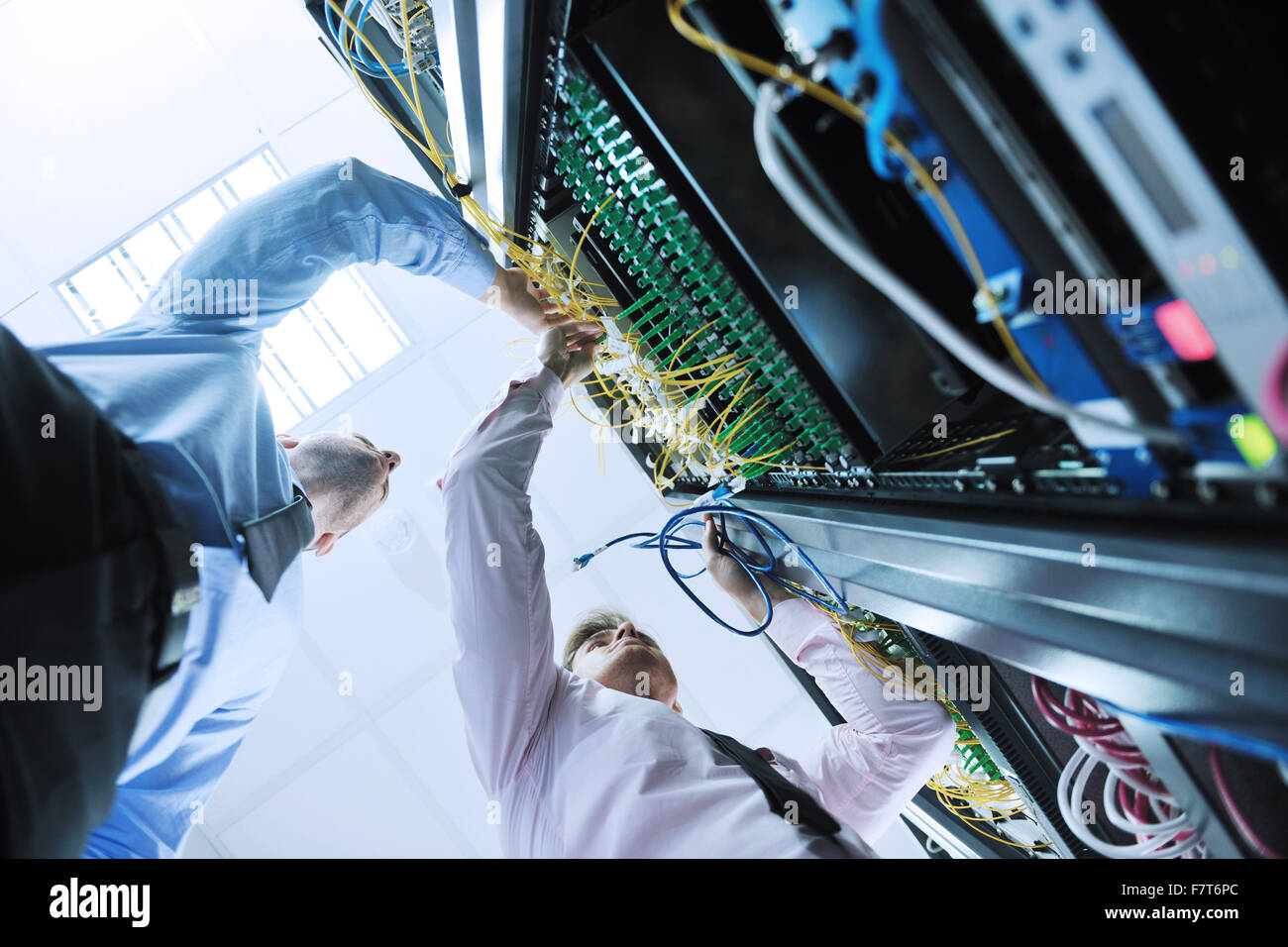 group of young business people it engineer in network server room ...