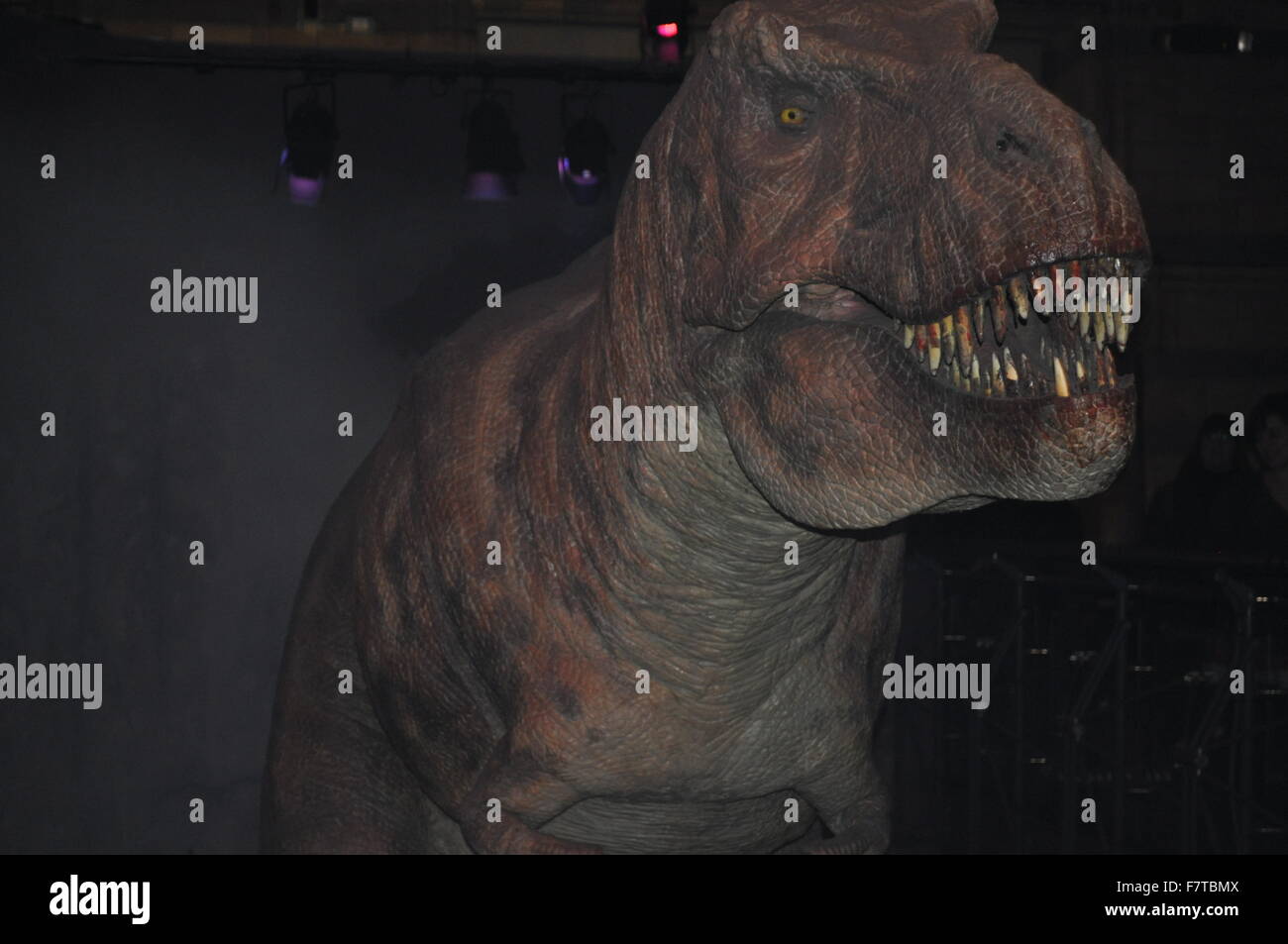 Dinosaur stature with bloody teeth at The Natural History Museum in London. Stock Photo
