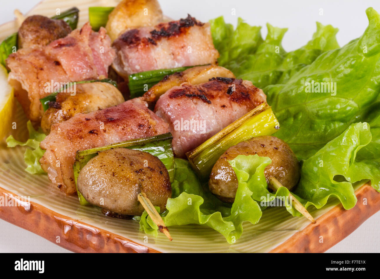 Bacon wrapped grilled Scallops with mushrooms and bacon Stock Photo Alamy