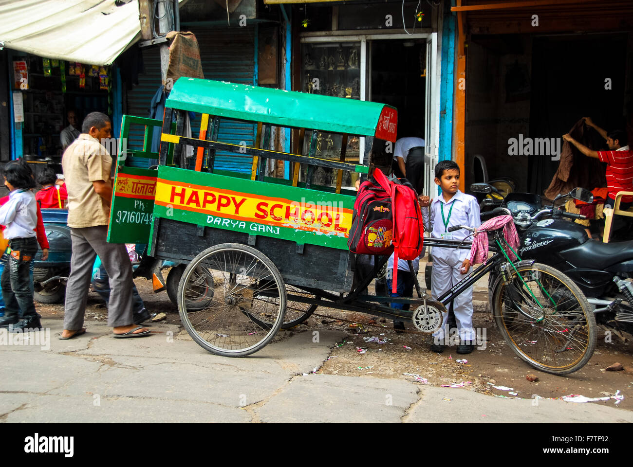 heavy load at rickshaw in new delhi india Stock Photo