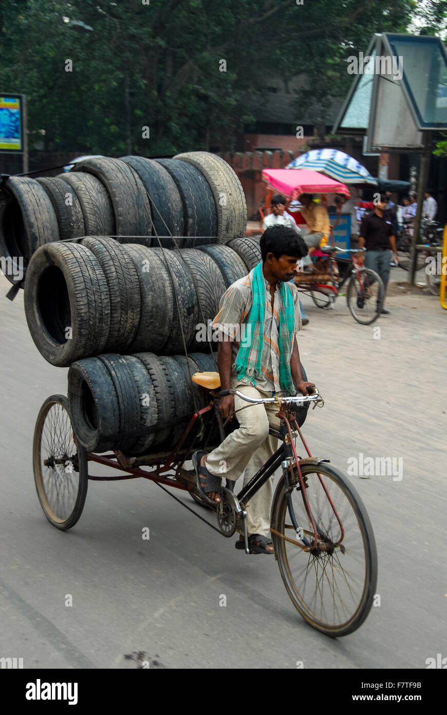 heavy load at rickshaw in new delhi india Stock Photo