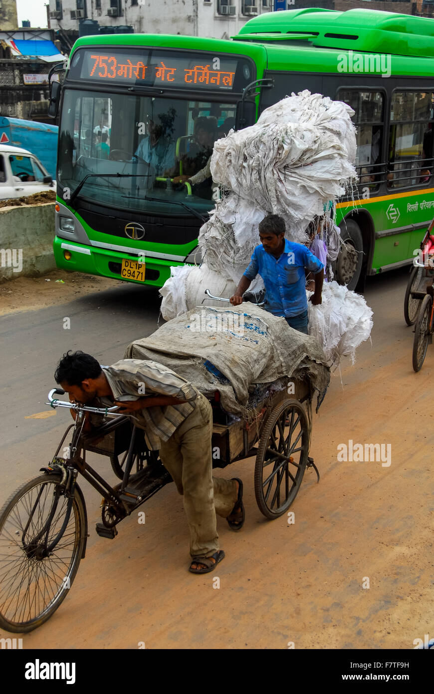 heavy load at rickshaw in new delhi india Stock Photo